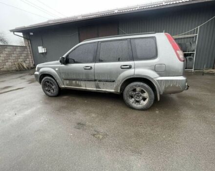 Серый Ниссан ИксТрейл, объемом двигателя 2 л и пробегом 303 тыс. км за 3600 $, фото 4 на Automoto.ua