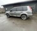 Серый Ниссан ИксТрейл, объемом двигателя 2 л и пробегом 303 тыс. км за 3600 $, фото 4 на Automoto.ua
