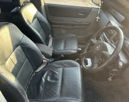 Сірий Ніссан ІксТрейл, об'ємом двигуна 2.2 л та пробігом 258 тис. км за 2800 $, фото 7 на Automoto.ua