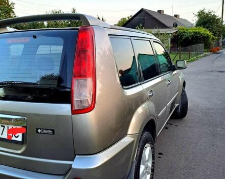 Серый Ниссан ИксТрейл, объемом двигателя 2 л и пробегом 214 тыс. км за 6585 $, фото 2 на Automoto.ua