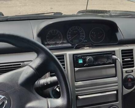 Серый Ниссан ИксТрейл, объемом двигателя 2 л и пробегом 350 тыс. км за 7200 $, фото 24 на Automoto.ua