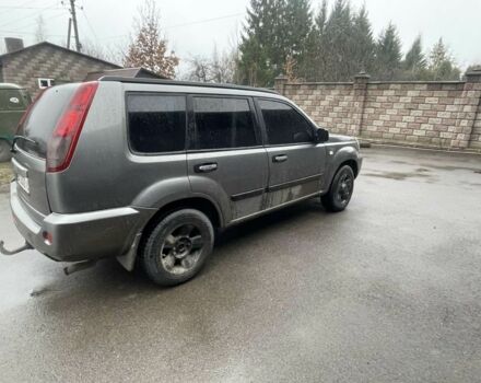 Серый Ниссан ИксТрейл, объемом двигателя 2 л и пробегом 303 тыс. км за 3600 $, фото 1 на Automoto.ua