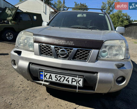 Сірий Ніссан ІксТрейл, об'ємом двигуна 2 л та пробігом 349 тис. км за 5500 $, фото 4 на Automoto.ua