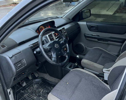 Серый Ниссан ИксТрейл, объемом двигателя 2 л и пробегом 303 тыс. км за 4699 $, фото 8 на Automoto.ua