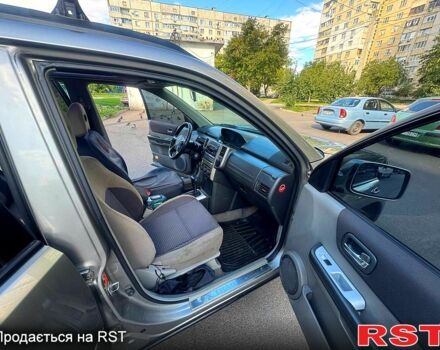 Серый Ниссан ИксТрейл, объемом двигателя 2 л и пробегом 283 тыс. км за 6500 $, фото 4 на Automoto.ua