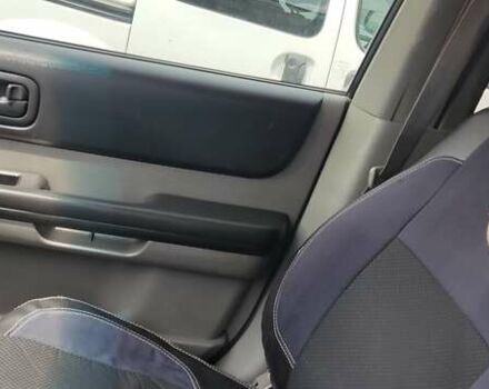 Серый Ниссан ИксТрейл, объемом двигателя 2 л и пробегом 350 тыс. км за 7200 $, фото 22 на Automoto.ua