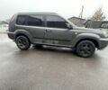 Серый Ниссан ИксТрейл, объемом двигателя 2 л и пробегом 303 тыс. км за 3600 $, фото 2 на Automoto.ua