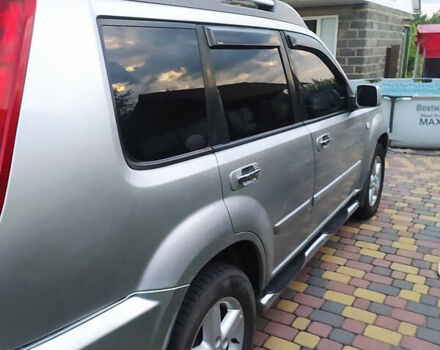 Сірий Ніссан ІксТрейл, об'ємом двигуна 2.49 л та пробігом 250 тис. км за 7500 $, фото 4 на Automoto.ua