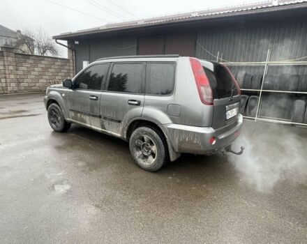 Серый Ниссан ИксТрейл, объемом двигателя 2 л и пробегом 303 тыс. км за 3600 $, фото 5 на Automoto.ua