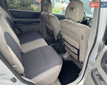 Серый Ниссан ИксТрейл, объемом двигателя 2 л и пробегом 209 тыс. км за 6800 $, фото 13 на Automoto.ua