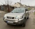 Серый Ниссан ИксТрейл, объемом двигателя 2 л и пробегом 230 тыс. км за 6000 $, фото 1 на Automoto.ua