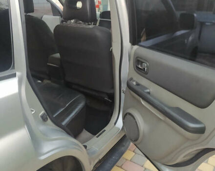 Сірий Ніссан ІксТрейл, об'ємом двигуна 2.49 л та пробігом 250 тис. км за 7500 $, фото 8 на Automoto.ua