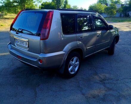 Серый Ниссан ИксТрейл, объемом двигателя 2 л и пробегом 240 тыс. км за 4200 $, фото 3 на Automoto.ua