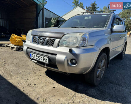 Сірий Ніссан ІксТрейл, об'ємом двигуна 2 л та пробігом 349 тис. км за 5500 $, фото 3 на Automoto.ua