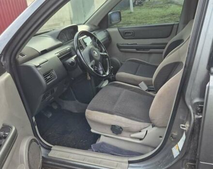 Серый Ниссан ИксТрейл, объемом двигателя 2.2 л и пробегом 383 тыс. км за 6000 $, фото 4 на Automoto.ua