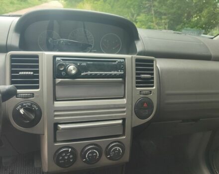 Серый Ниссан ИксТрейл, объемом двигателя 2.2 л и пробегом 300 тыс. км за 4900 $, фото 5 на Automoto.ua