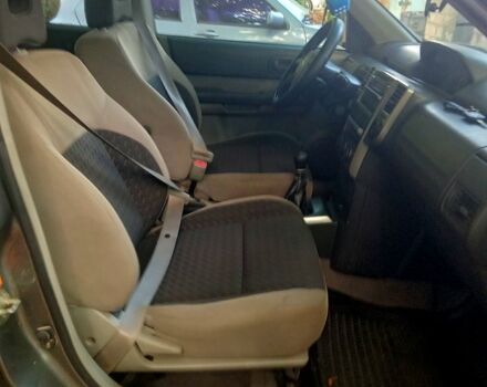 Серый Ниссан ИксТрейл, объемом двигателя 2.2 л и пробегом 255 тыс. км за 4000 $, фото 4 на Automoto.ua