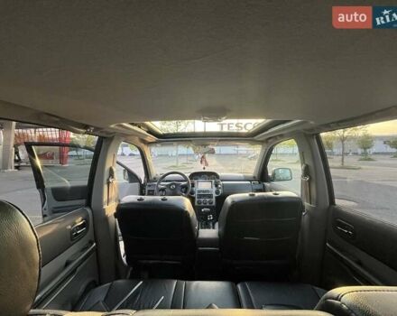 Серый Ниссан ИксТрейл, объемом двигателя 2.5 л и пробегом 360 тыс. км за 6417 $, фото 9 на Automoto.ua