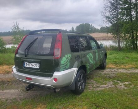 Серый Ниссан ИксТрейл, объемом двигателя 2 л и пробегом 300 тыс. км за 3579 $, фото 2 на Automoto.ua