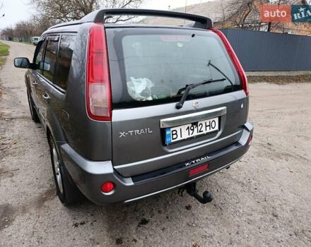 Сірий Ніссан ІксТрейл, об'ємом двигуна 2.49 л та пробігом 211 тис. км за 7500 $, фото 5 на Automoto.ua