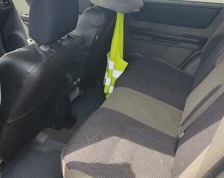 Серый Ниссан ИксТрейл, объемом двигателя 2 л и пробегом 350 тыс. км за 7200 $, фото 27 на Automoto.ua