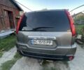 Серый Ниссан ИксТрейл, объемом двигателя 2 л и пробегом 240 тыс. км за 8700 $, фото 3 на Automoto.ua