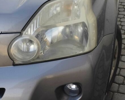 Серый Ниссан ИксТрейл, объемом двигателя 2 л и пробегом 173 тыс. км за 9200 $, фото 1 на Automoto.ua