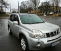 Сірий Ніссан ІксТрейл, об'ємом двигуна 2.5 л та пробігом 295 тис. км за 8200 $, фото 1 на Automoto.ua