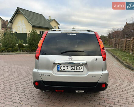 Серый Ниссан ИксТрейл, объемом двигателя 2.49 л и пробегом 155 тыс. км за 8499 $, фото 6 на Automoto.ua