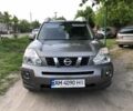 Серый Ниссан ИксТрейл, объемом двигателя 2 л и пробегом 320 тыс. км за 8000 $, фото 1 на Automoto.ua