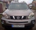 Сірий Ніссан ІксТрейл, об'ємом двигуна 2 л та пробігом 212 тис. км за 9800 $, фото 1 на Automoto.ua