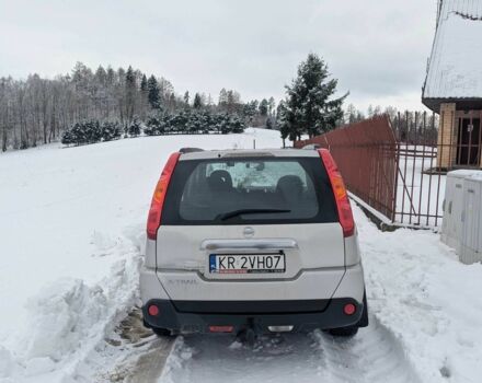 Серый Ниссан ИксТрейл, объемом двигателя 2 л и пробегом 247 тыс. км за 5911 $, фото 2 на Automoto.ua