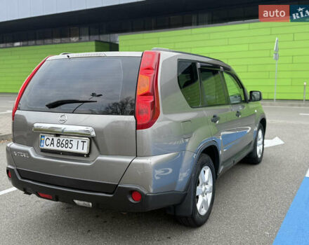 Серый Ниссан ИксТрейл, объемом двигателя 2 л и пробегом 235 тыс. км за 8300 $, фото 12 на Automoto.ua