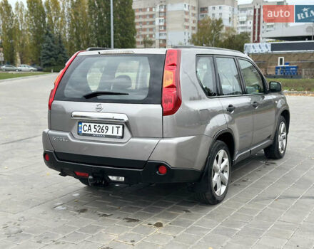 Серый Ниссан ИксТрейл, объемом двигателя 2 л и пробегом 247 тыс. км за 8800 $, фото 4 на Automoto.ua