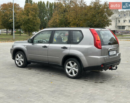 Серый Ниссан ИксТрейл, объемом двигателя 2 л и пробегом 247 тыс. км за 8800 $, фото 7 на Automoto.ua