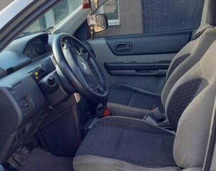 Серый Ниссан ИксТрейл, объемом двигателя 2.2 л и пробегом 320 тыс. км за 7800 $, фото 6 на Automoto.ua