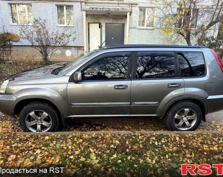 Серый Ниссан ИксТрейл, объемом двигателя 2.5 л и пробегом 333 тыс. км за 7100 $, фото 4 на Automoto.ua