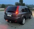 Сірий Ніссан ІксТрейл, об'ємом двигуна 2 л та пробігом 275 тис. км за 8500 $, фото 1 на Automoto.ua