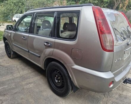 Сірий Ніссан ІксТрейл, об'ємом двигуна 2.5 л та пробігом 213 тис. км за 5100 $, фото 2 на Automoto.ua