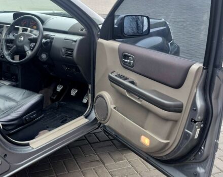 Серый Ниссан ИксТрейл, объемом двигателя 2 л и пробегом 160 тыс. км за 3550 $, фото 11 на Automoto.ua