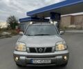 Серый Ниссан ИксТрейл, объемом двигателя 2.2 л и пробегом 300 тыс. км за 3500 $, фото 5 на Automoto.ua