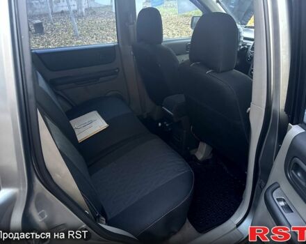 Серый Ниссан ИксТрейл, объемом двигателя 2.5 л и пробегом 333 тыс. км за 7100 $, фото 9 на Automoto.ua