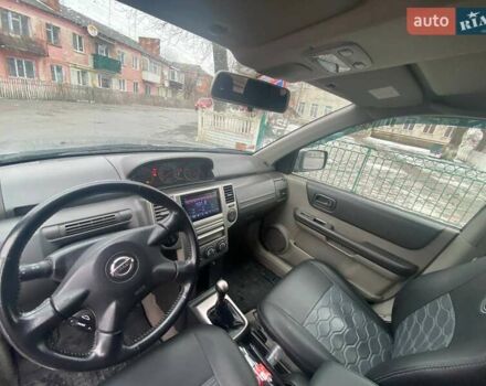 Серый Ниссан ИксТрейл, объемом двигателя 2 л и пробегом 301 тыс. км за 7400 $, фото 15 на Automoto.ua