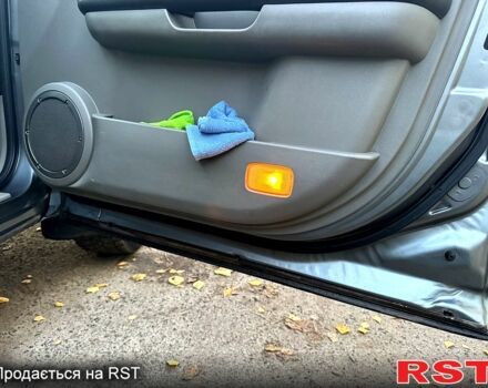 Серый Ниссан ИксТрейл, объемом двигателя 2.5 л и пробегом 333 тыс. км за 7100 $, фото 12 на Automoto.ua