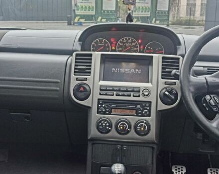 Серый Ниссан ИксТрейл, объемом двигателя 2 л и пробегом 160 тыс. км за 3550 $, фото 8 на Automoto.ua