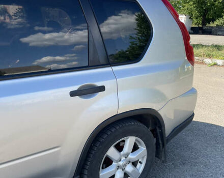 Серый Ниссан ИксТрейл, объемом двигателя 2.49 л и пробегом 248 тыс. км за 9800 $, фото 1 на Automoto.ua