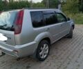 Серый Ниссан ИксТрейл, объемом двигателя 2 л и пробегом 210 тыс. км за 4500 $, фото 2 на Automoto.ua