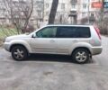 Сірий Ніссан ІксТрейл, об'ємом двигуна 2 л та пробігом 196 тис. км за 9000 $, фото 1 на Automoto.ua