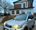 Серый Ниссан ИксТрейл, объемом двигателя 25 л и пробегом 264 тыс. км за 7900 $, фото 1 на Automoto.ua