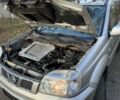 Серый Ниссан ИксТрейл, объемом двигателя 2.2 л и пробегом 297 тыс. км за 4950 $, фото 12 на Automoto.ua